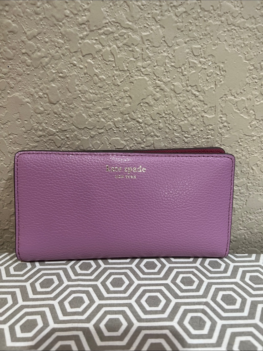 kate spade large slim bifold pink mauve leather wallet with gold logo